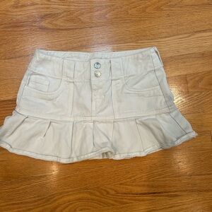 White denim pleated mini skirt